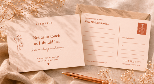 Tetherus greeting card and postcard set with a pen on a textured surface.